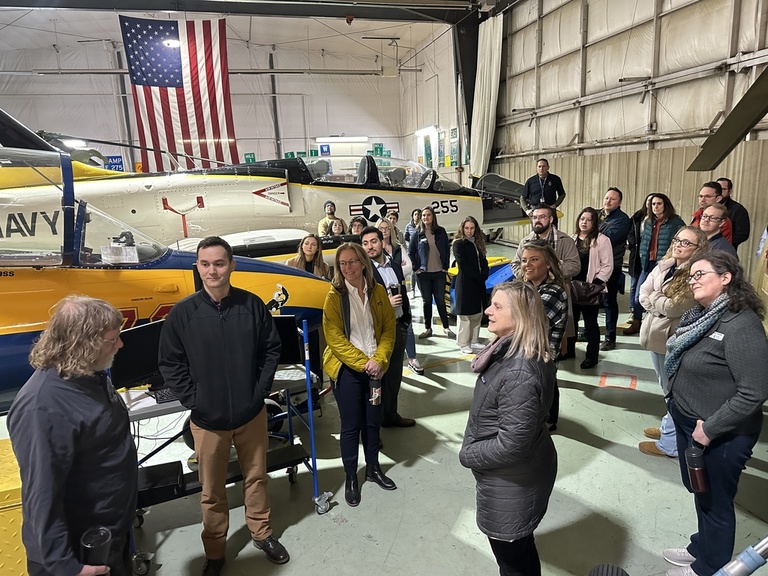 A group tours the OPL hangar