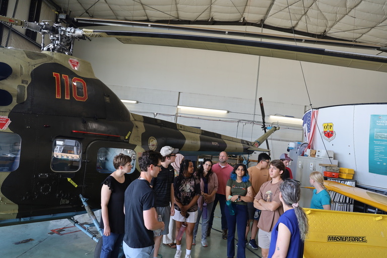A tour group inside the OPL hangar