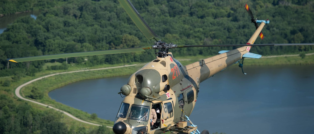An Mi-2 helicopter in the air