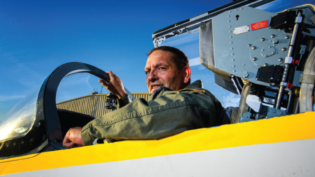 Tom Schnell sitting in a cockpit